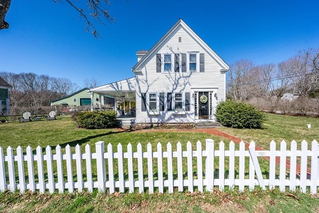 1243 Main St Unit 1243, Barnstable, MA 02635 - view of front of house with fence and a front yard