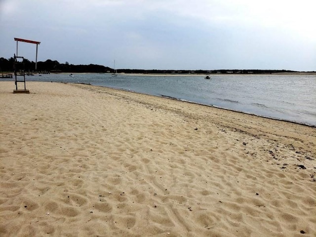 1243 Main St Unit 1243, Barnstable, MA 02635 - property view of water featuring a beach view