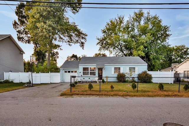 view of front of house with a garage and driveway