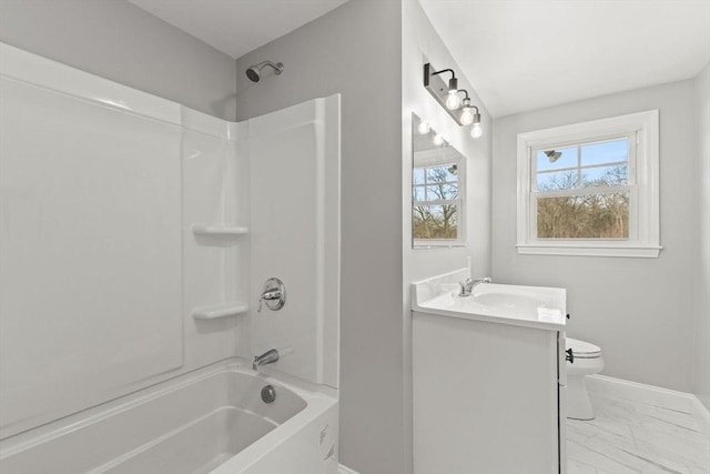 full bathroom with shower / bathing tub combination, vanity, and toilet