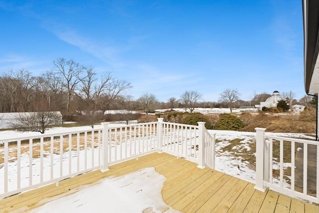 view of snow covered deck