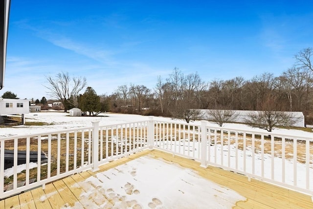 view of snow covered deck