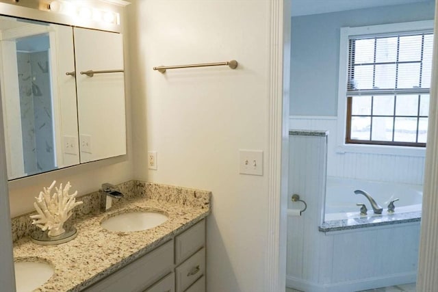 6 Sunrise, Auburn, MA 01501 - bathroom with double vanity, a garden tub, and wainscoting