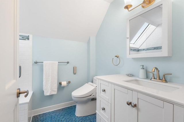 bathroom with toilet, tile patterned flooring, baseboards, and vanity