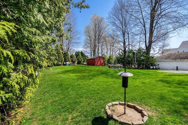 228 Main St, Groton, MA 01450 - view of yard with a storage shed and an outdoor structure