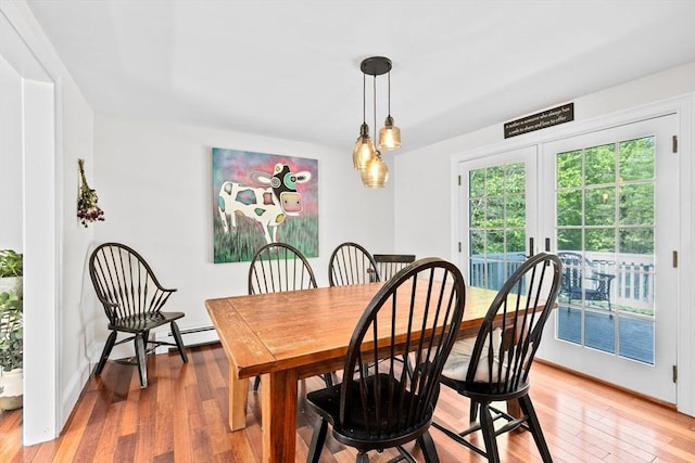 59 First Parish Rd, Norwell, MA 02061 - dining space featuring light wood-style flooring and french doors