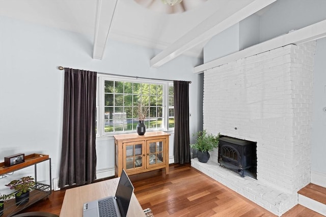 59 First Parish Rd, Norwell, MA 02061 - sitting room featuring a wood stove, wood finished floors, a ceiling fan, and a baseboard heating unit