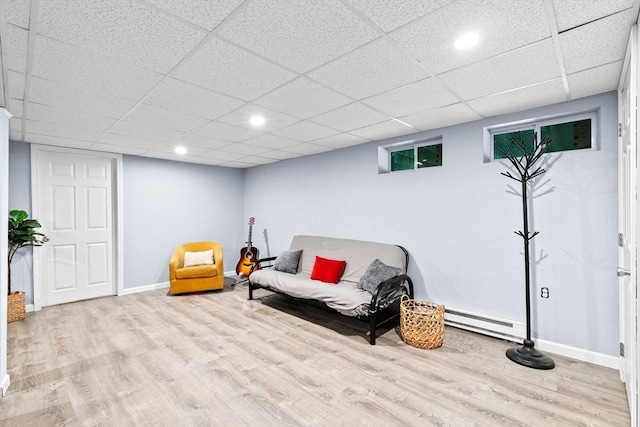 59 First Parish Rd, Norwell, MA 02061 - living area featuring a baseboard heating unit, wood finished floors, a paneled ceiling, and recessed lighting