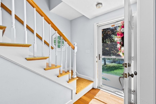 59 First Parish Rd, Norwell, MA 02061 - foyer entrance with wood finished floors and stairway