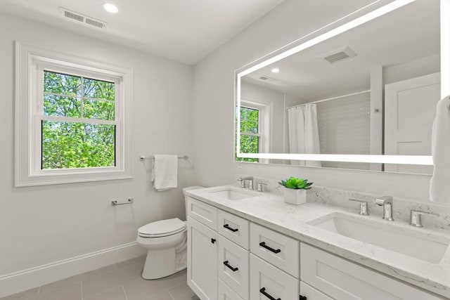 bathroom featuring tile patterned flooring, toilet, baseboards, curtained shower, and double vanity