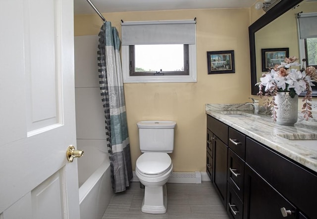 136 Maryland Ave, Somerset, MA 02726 - full bath featuring toilet, double vanity, shower / tub combo with curtain, baseboards, and tile patterned floors