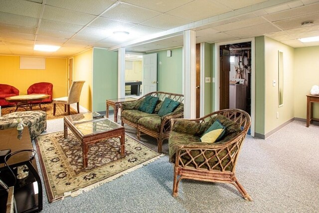 136 Maryland Ave, Somerset, MA 02726 - living room featuring carpet floors, a drop ceiling, and baseboards