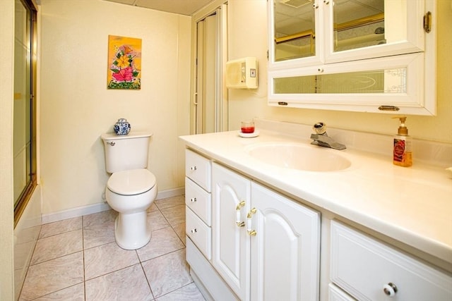 136 Maryland Ave, Somerset, MA 02726 - bathroom with vanity, toilet, baseboards, and tile patterned flooring