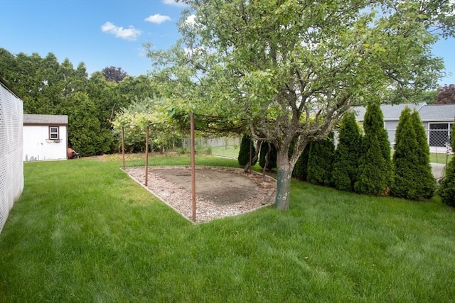 136 Maryland Ave, Somerset, MA 02726 - view of grassy yard featuring an outdoor structure