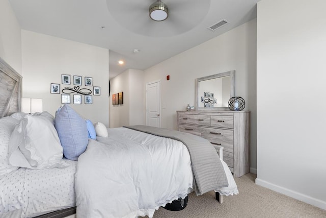 bedroom featuring light colored carpet, a ceiling fan, baseboards, recessed lighting, and visible vents
