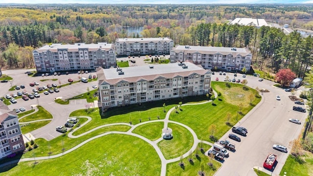 aerial view with a wooded view