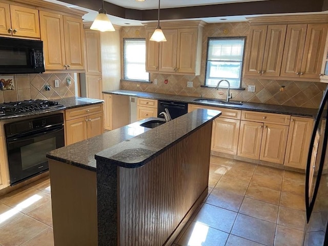 135-137 Summer St, Waltham, MA 02452 - kitchen featuring black appliances, a sink, decorative backsplash, dark stone countertops, and light tile patterned floors