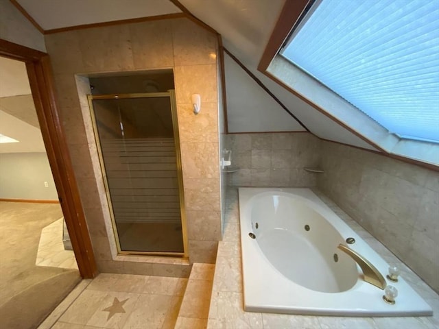 135-137 Summer St, Waltham, MA 02452 - full bathroom with vaulted ceiling, a stall shower, a whirlpool tub, and tile walls
