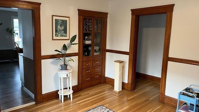 135-137 Summer St, Waltham, MA 02452 - hall with light wood-type flooring, baseboards, and an office area