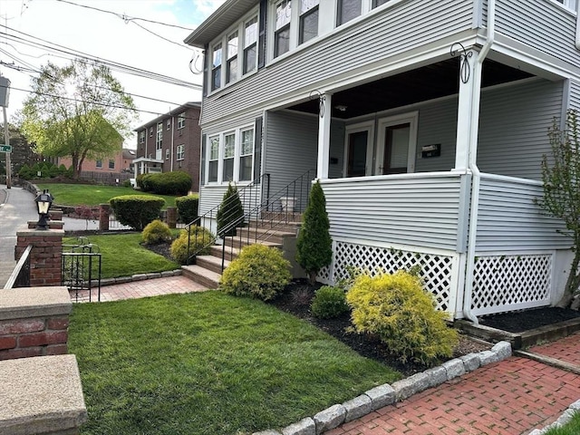 135-137 Summer St, Waltham, MA 02452 - entrance to property featuring a lawn