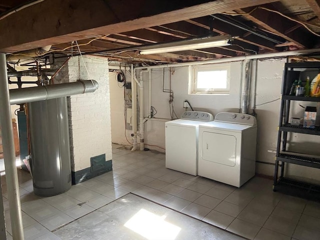 135-137 Summer St, Waltham, MA 02452 - basement featuring washing machine and dryer