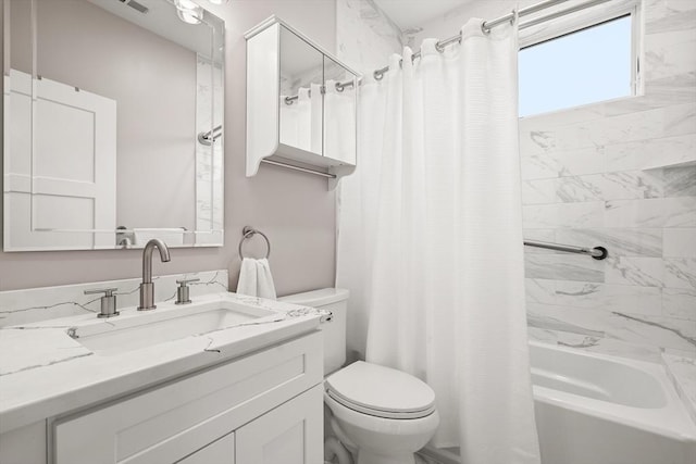 bathroom featuring toilet, shower / bath combination with curtain, and vanity