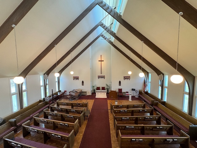 staircase featuring beamed ceiling and high vaulted ceiling