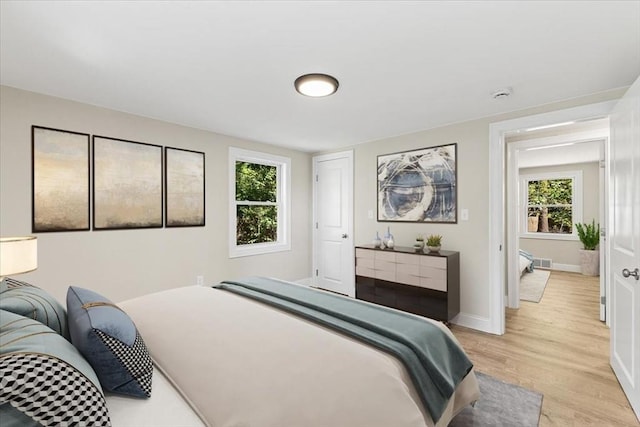 bedroom featuring light hardwood / wood-style flooring