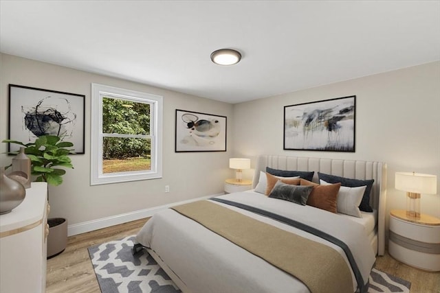 bedroom with light wood-type flooring