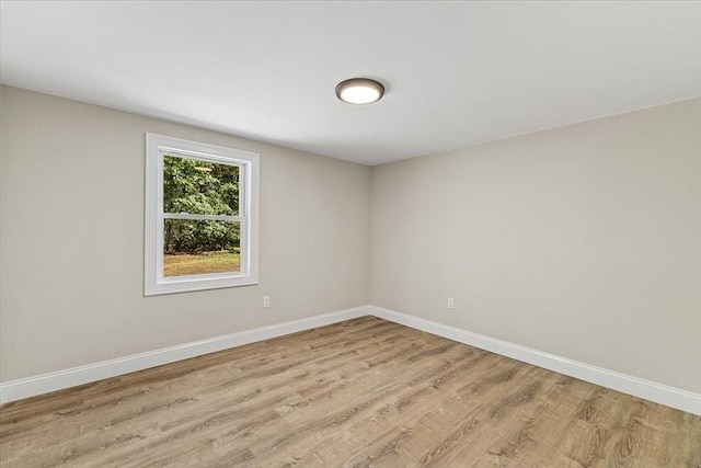 unfurnished room featuring light hardwood / wood-style flooring