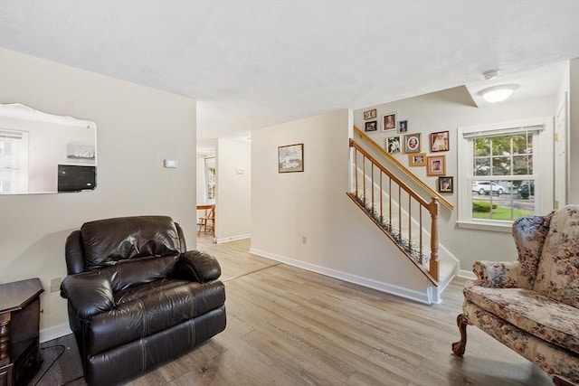 10 Oak Ridge Dr Unit 6, Maynard, MA 01754 - living area with wood finished floors, stairs, and baseboards