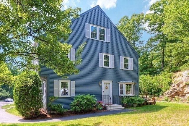 10 Oak Ridge Dr Unit 6, Maynard, MA 01754 - view of front of house featuring a front lawn