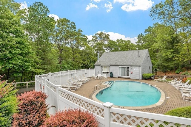 10 Oak Ridge Dr Unit 6, Maynard, MA 01754 - view of swimming pool featuring view of scattered trees and a patio