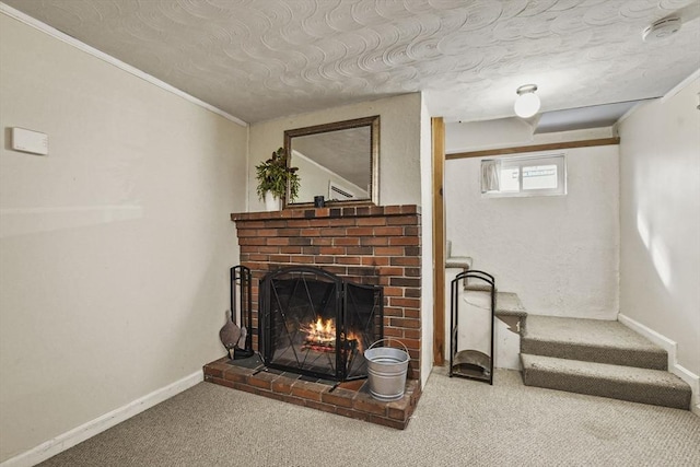 living room with a brick fireplace and carpet floors