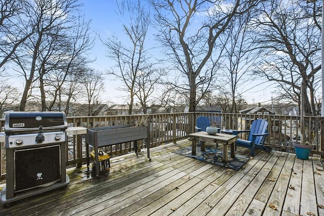 wooden terrace with area for grilling