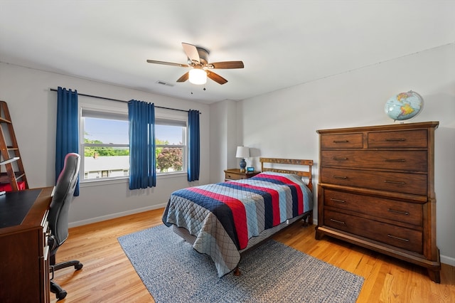 57 Hampton St, Auburn, MA 01501 - bedroom with light wood-type flooring, a desk, and ceiling fan