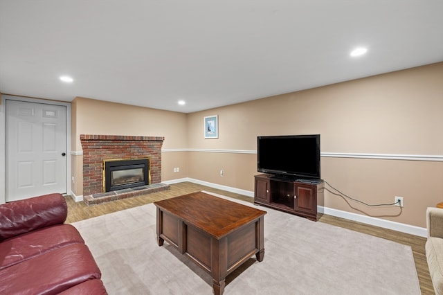 57 Hampton St, Auburn, MA 01501 - living area with recessed lighting, a fireplace, and light wood finished floors