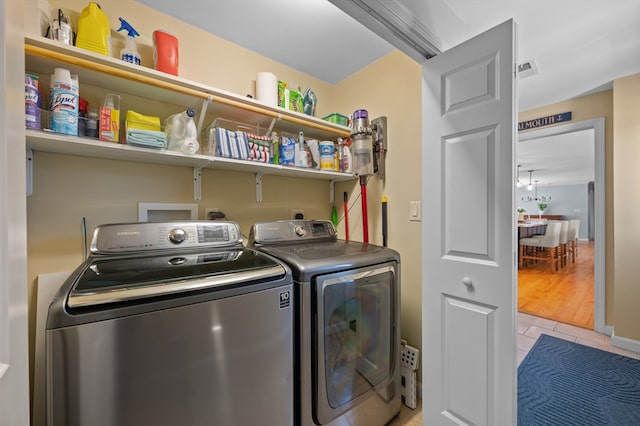 57 Hampton St, Auburn, MA 01501 - laundry room with washing machine and clothes dryer and light tile patterned flooring