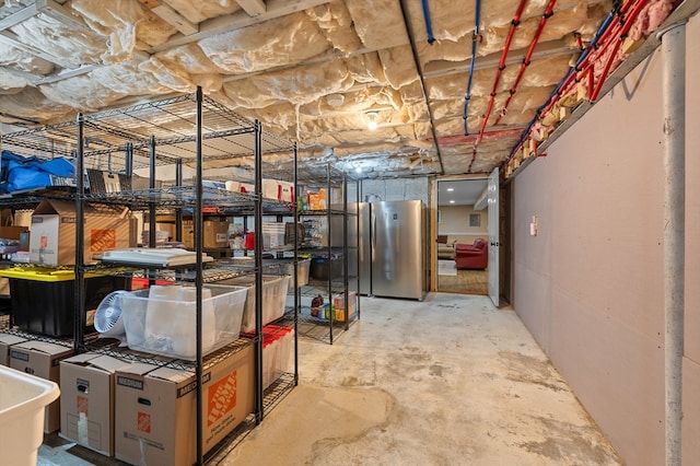 57 Hampton St, Auburn, MA 01501 - unfinished below grade area featuring freestanding refrigerator