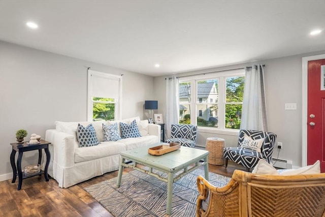 22 Janet St, Plymouth, MA 02360 - living area with dark wood finished floors, plenty of natural light, recessed lighting, and baseboard heating