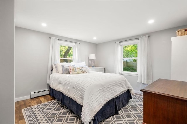 22 Janet St, Plymouth, MA 02360 - bedroom with a baseboard heating unit, wood finished floors, and recessed lighting