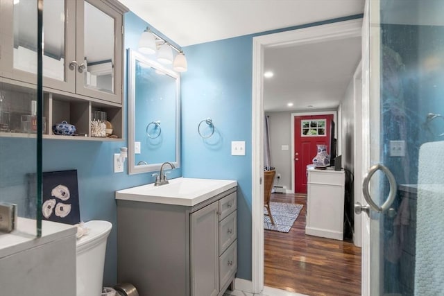 22 Janet St, Plymouth, MA 02360 - bathroom featuring wood finished floors, vanity, and a shower with shower door