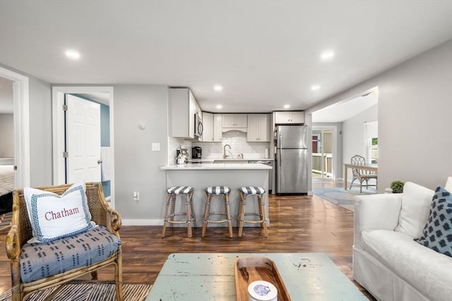 22 Janet St, Plymouth, MA 02360 - living room with dark wood-type flooring and recessed lighting