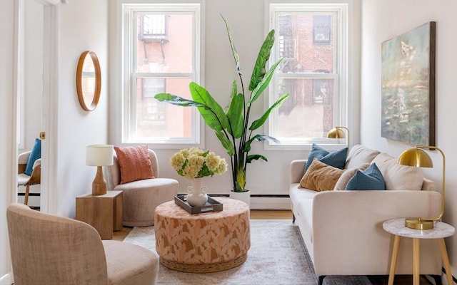 11 Revere Unit 4, Boston, MA 02114 - sitting room featuring plenty of natural light and baseboard heating