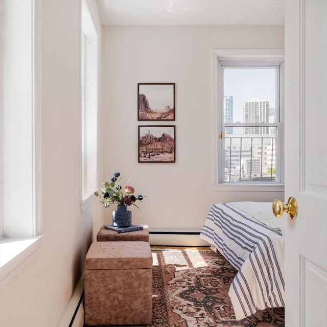11 Revere Unit 4, Boston, MA 02114 - bedroom featuring a baseboard heating unit