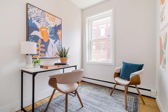11 Revere Unit 4, Boston, MA 02114 - office space featuring a baseboard radiator, wood finished floors, and baseboards