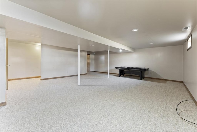 finished basement with recessed lighting, visible vents, carpet flooring, and baseboards