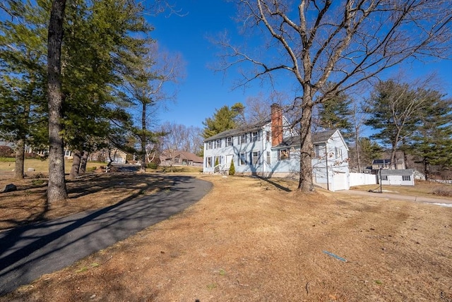 view of front of property with a chimney