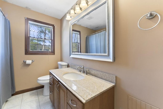 bathroom featuring tile patterned flooring, baseboards, toilet, radiator heating unit, and vanity