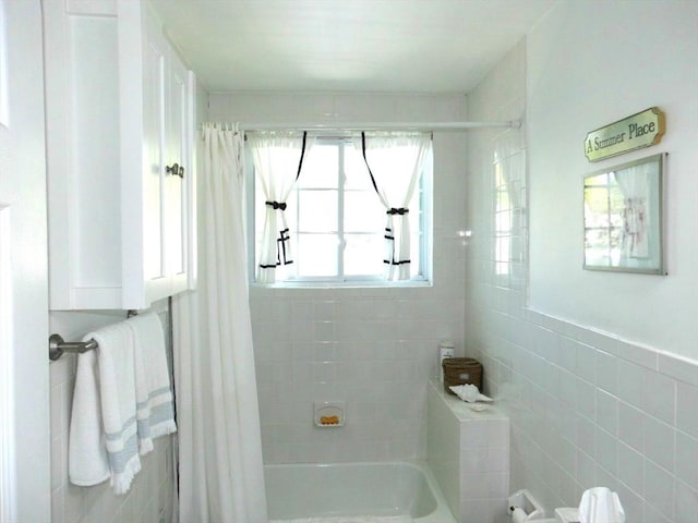 55A Millville Cir, Salem, NH 03079 - bathroom with shower / tub combo with curtain and tile walls